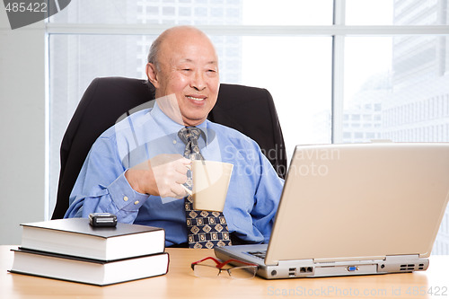 Image of Senior asian businessman