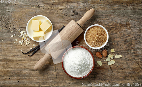 Image of baking ingredients on wooden table