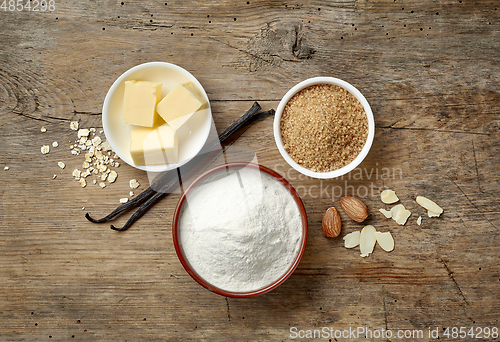 Image of baking ingredients on wooden table