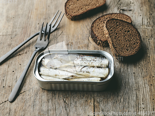 Image of open sardines can