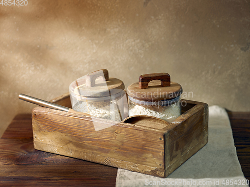 Image of product storage jars in a wooden box