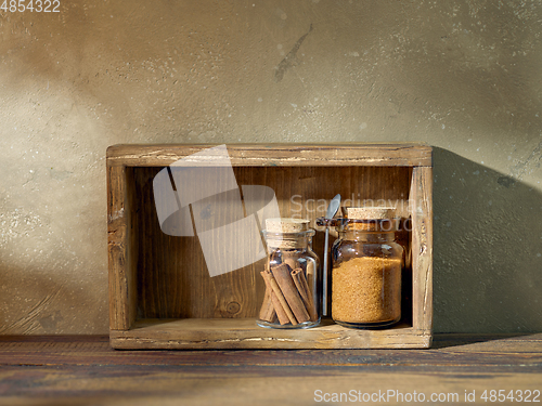 Image of product storage jars in a wooden box