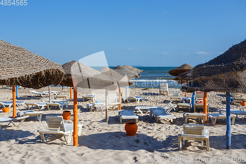 Image of Beach umbrellas on sandy Tunis beach