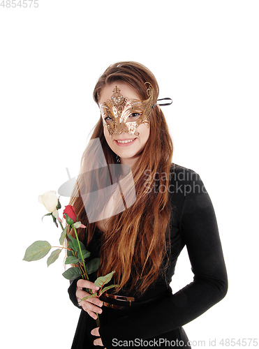 Image of Beautiful woman with face mask and roses