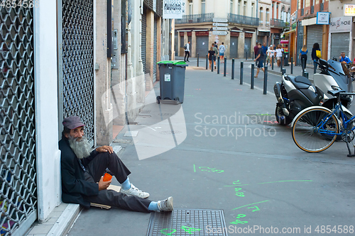 Image of Homeless man beggar street France