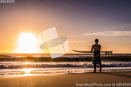 Image of Surfer watching the waves