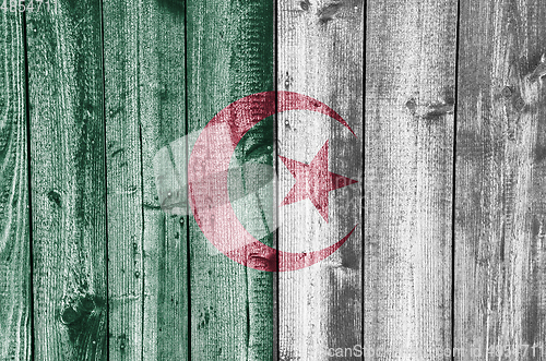 Image of Flag of Algeria on weathered wood