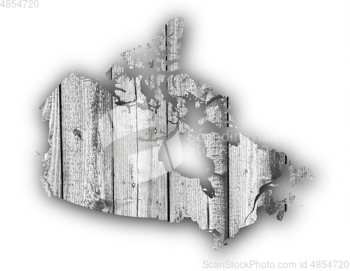 Image of Map of Canada on weathered wood