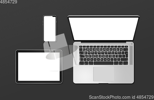 Image of Laptop, tablet and phone set mockup isolated on black. 3D render