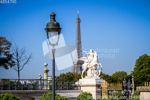 Image of Marble statue and Eiffel Tower view from the Tuileries Garden, P