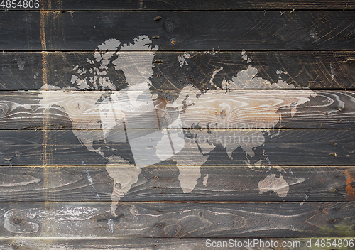 Image of World map on a wooden wall