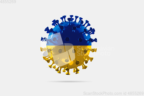 Image of Model of COVID-19 coronavirus colored in national Ukraine flag, concept of pandemic spreading