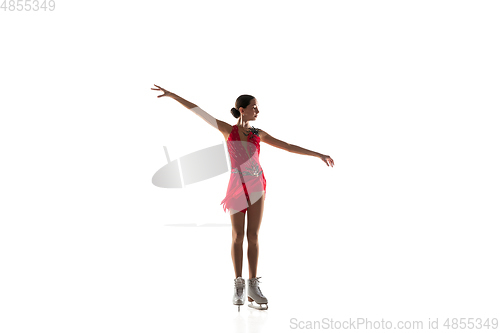 Image of Girl figure skating isolated on white studio backgound with copyspace