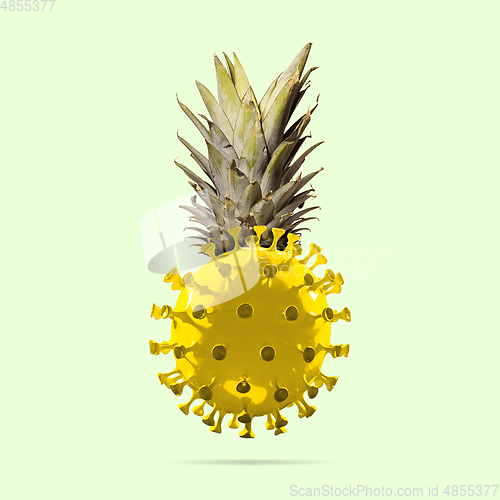 Image of Pineapple made of models of COVID-19 coronavirus, concept of pandemic spreading