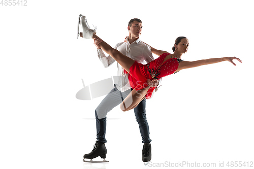 Image of Duo figure skating isolated on white studio backgound with copyspace