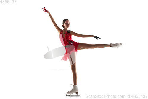 Image of Girl figure skating isolated on white studio backgound with copyspace