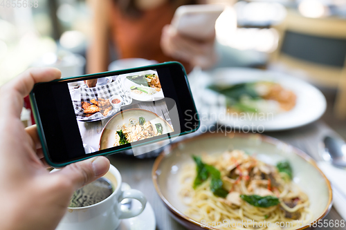 Image of Taking photo on the food in restaurant