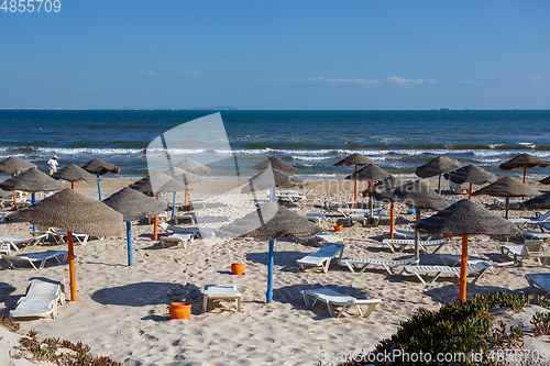 Image of Beach umbrellas on sandy Tunis beach