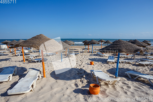 Image of Beach umbrellas on sandy Tunis beach
