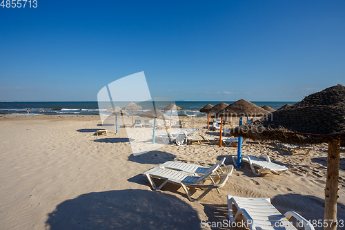 Image of Beach umbrellas on sandy Tunis beach