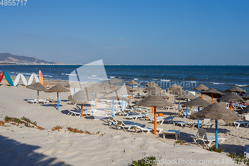 Image of Beach umbrellas on sandy Tunis beach