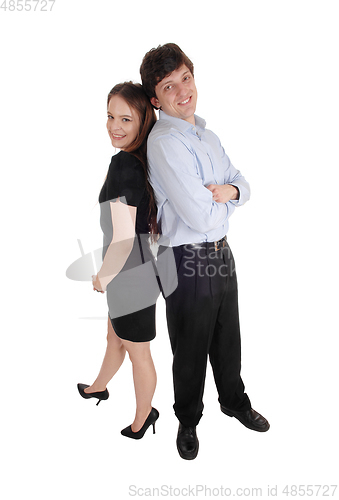 Image of Lovely couple standing back to back