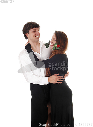 Image of Happy young couple hugging