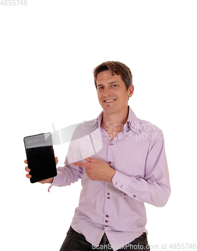 Image of Young man pointing at his tablet screen