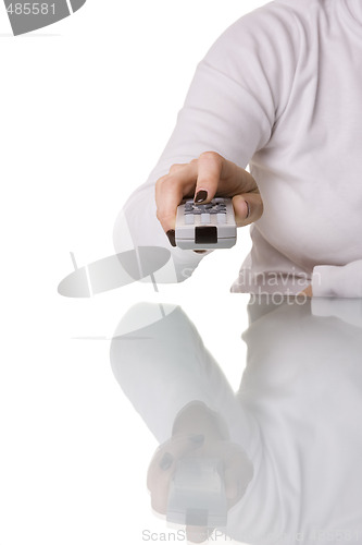 Image of woman holding a remote control