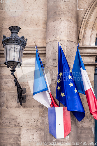 Image of French and European flags on Senate entrance, Paris, France