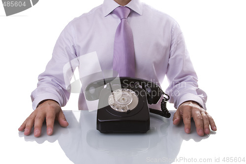 Image of Businessman waiting for a call