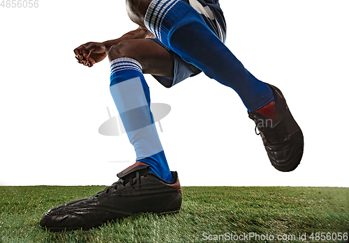 Image of Football or soccer player on white background - motion, action, activity concept, wide angle