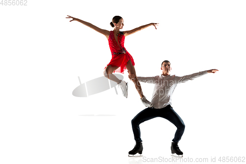 Image of Duo figure skating isolated on white studio backgound with copyspace