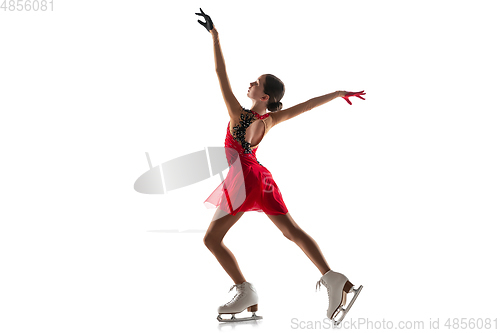 Image of Girl figure skating isolated on white studio backgound with copyspace