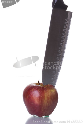 Image of Knife cutting an apple