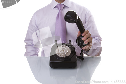 Image of businessman answer a call
