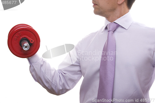Image of businessman lifting weights