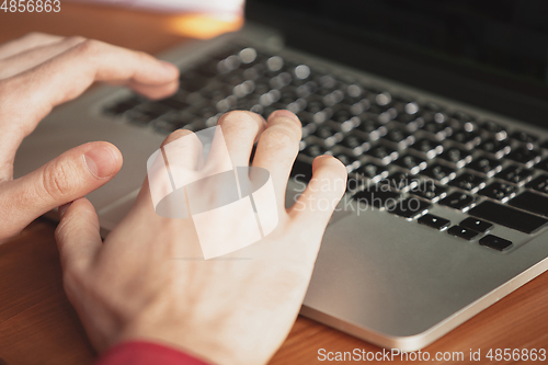 Image of Caucasian entrepreneur, businessman, manager working in office, close up
