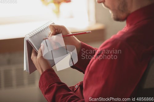 Image of Caucasian entrepreneur, businessman, manager working in office, close up