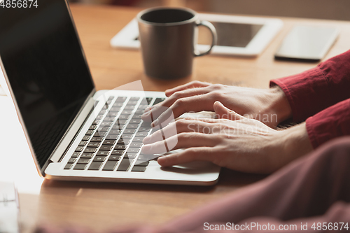 Image of Caucasian entrepreneur, businessman, manager working in office, close up