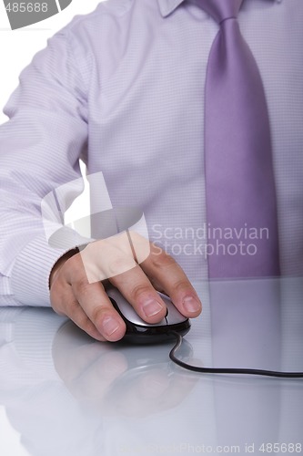 Image of businessman using a mouse 