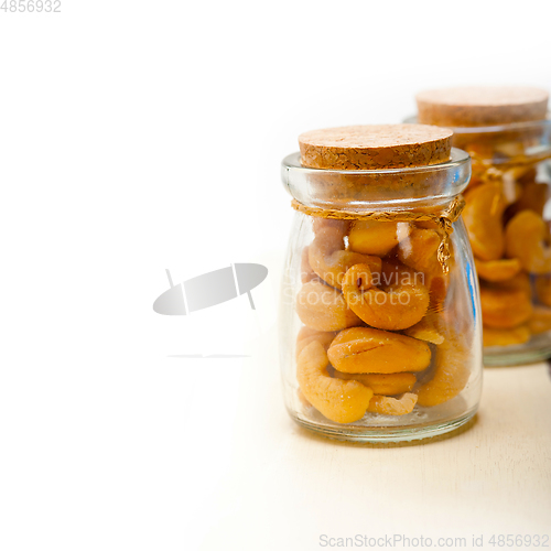 Image of cashew nuts on a glass jar