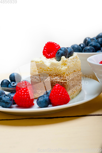 Image of fresh raspberry and blueberry cake