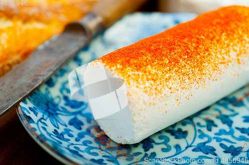 Image of French cheese and fresh  baguette on a wood cutter