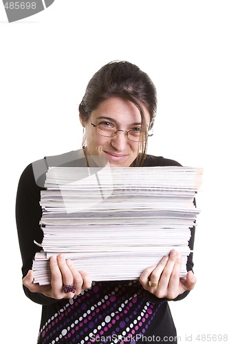 Image of Woman with a pile of books