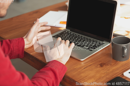 Image of Caucasian entrepreneur, businessman, manager working in office, close up