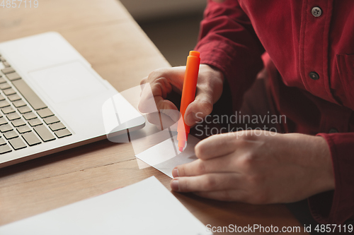 Image of Caucasian entrepreneur, businessman, manager working in office, close up