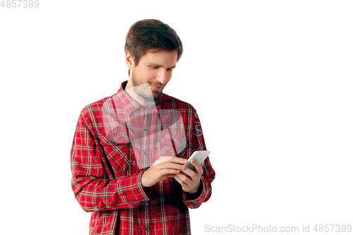 Image of Man using smartphone isolated on white studio background