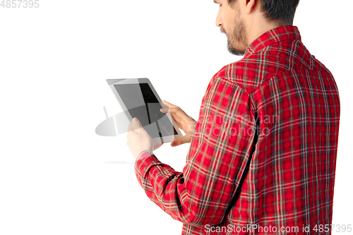 Image of Close up of man using tablet with blank screen isolated on white studio background