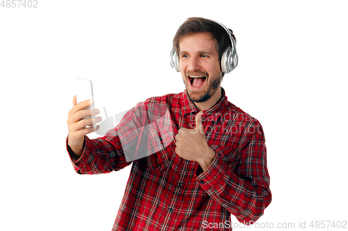 Image of Man using smartphone isolated on white studio background